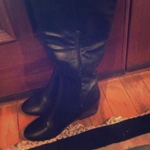 Thigh high wedge boot